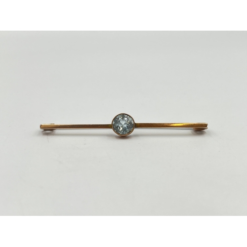 2375 - An antique 9ct gold blue topaz set brooch with base metal pin - approx. gross weight 1.9g