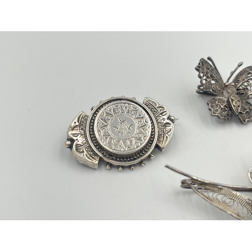 2381 - Four silver brooches to include hallmarked Chester foliate, Maltese .917, .925 butterfly etc. - appr... 