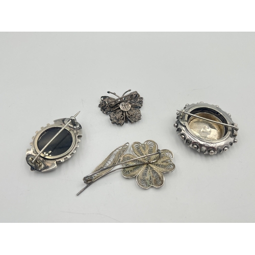 2381 - Four silver brooches to include hallmarked Chester foliate, Maltese .917, .925 butterfly etc. - appr... 