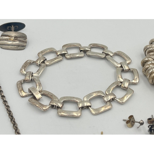 2396 - A collection of silver and white metal jewellery to include .925 chain, .925 bracelet. .835 cufflink... 