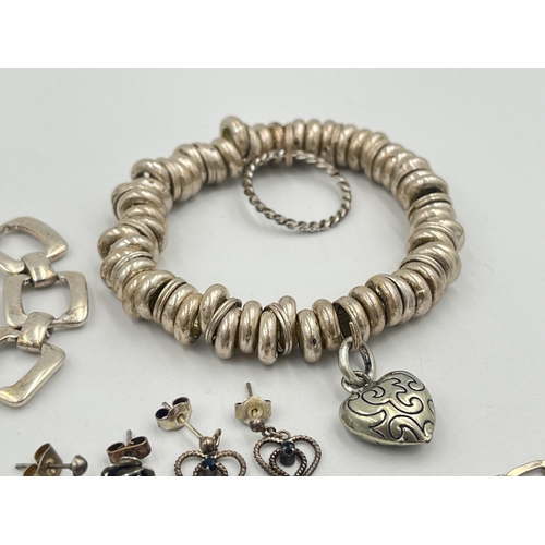 2396 - A collection of silver and white metal jewellery to include .925 chain, .925 bracelet. .835 cufflink... 