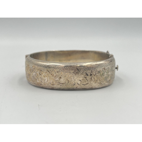 2398 - A hallmarked Birmingham silver foliate etched bangle - approx. gross weight 28g