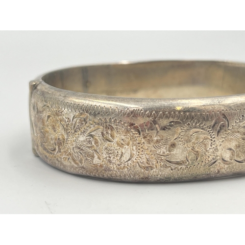 2398 - A hallmarked Birmingham silver foliate etched bangle - approx. gross weight 28g