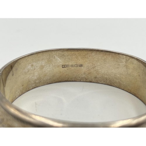 2398 - A hallmarked Birmingham silver foliate etched bangle - approx. gross weight 28g