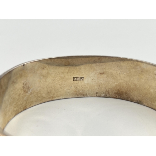 2398 - A hallmarked Birmingham silver foliate etched bangle - approx. gross weight 28g