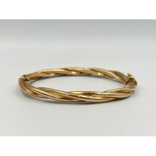 2399 - A hallmarked 9ct gold bangle - approx. gross weight 10g