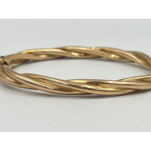 2399 - A hallmarked 9ct gold bangle - approx. gross weight 10g