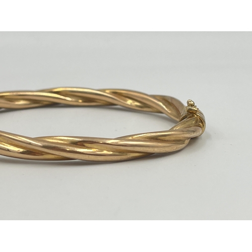 2399 - A hallmarked 9ct gold bangle - approx. gross weight 10g