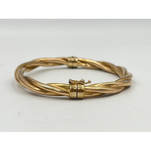 2399 - A hallmarked 9ct gold bangle - approx. gross weight 10g