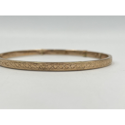 2401 - A hallmarked Birmingham 9ct gold bangle - approx. gross weight 3.8g