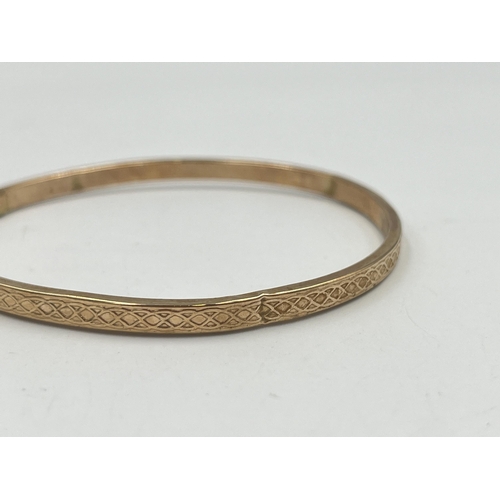 2401 - A hallmarked Birmingham 9ct gold bangle - approx. gross weight 3.8g