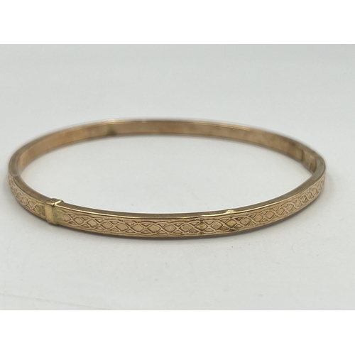 2401 - A hallmarked Birmingham 9ct gold bangle - approx. gross weight 3.8g