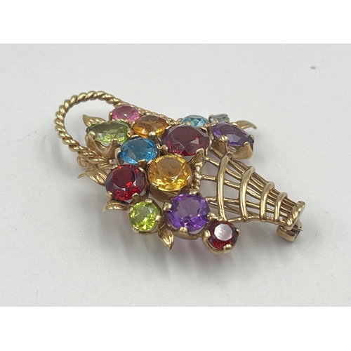 2407 - A hallmarked 9ct gold multi-gemstone flower basket brooch - approx. gross weight 8.6g