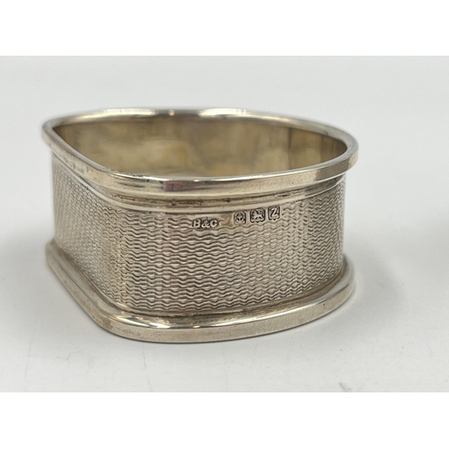 2531 - Two hallmarked sterling silver napkin rings, one Birmingham and one London - approx. gross weight 40... 