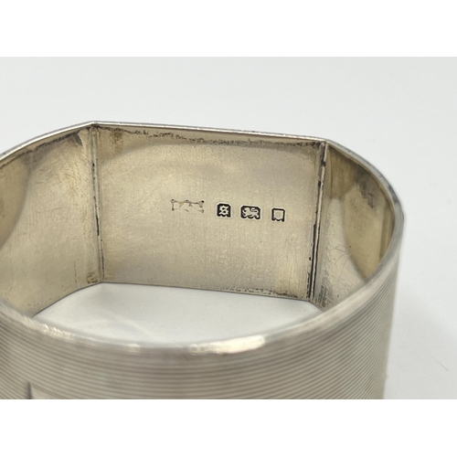 2531 - Two hallmarked sterling silver napkin rings, one Birmingham and one London - approx. gross weight 40... 