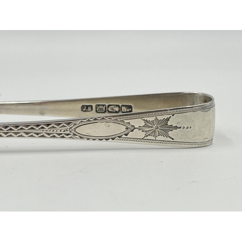 2536 - A pair of Victorian John Smyth & Sons hallmarked Dublin silver sugar tongs, dated 1899 - approx. gro... 