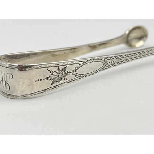 2536 - A pair of Victorian John Smyth & Sons hallmarked Dublin silver sugar tongs, dated 1899 - approx. gro... 