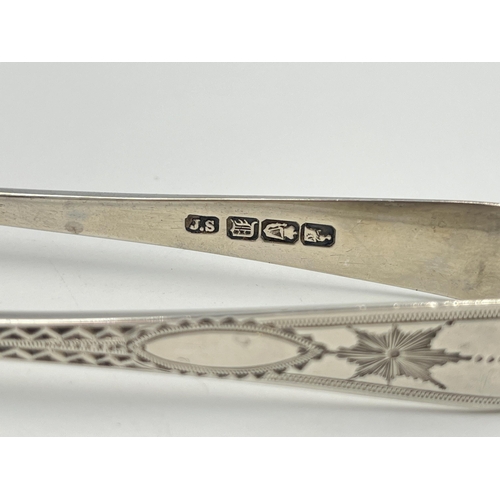 2536 - A pair of Victorian John Smyth & Sons hallmarked Dublin silver sugar tongs, dated 1899 - approx. gro... 