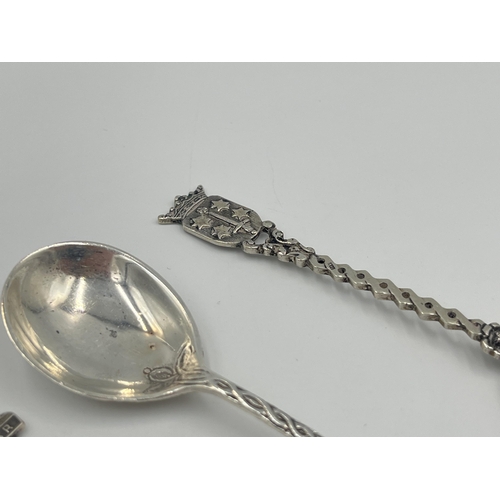 2541 - Three silver spoons, two hallmarked sterling and one .800 together with one white metal - approx. co... 