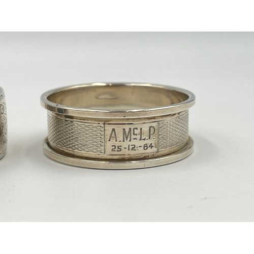 2542 - Two hallmarked Birmingham silver napkin rings - approx. gross weight 30g