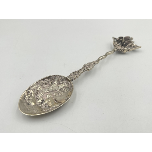 2549 - A hallmarked sterling silver collectors spoon depicting farming and ship scenes - approx. gross weig... 