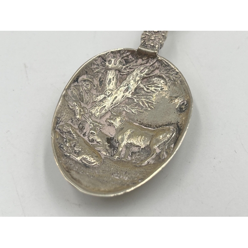 2549 - A hallmarked sterling silver collectors spoon depicting farming and ship scenes - approx. gross weig... 