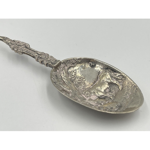 2549 - A hallmarked sterling silver collectors spoon depicting farming and ship scenes - approx. gross weig... 