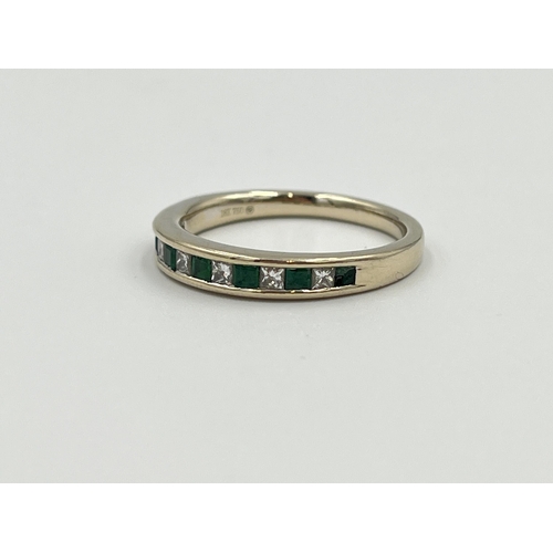 2039A - An 18ct gold emerald and 0.28ct diamond ring, size Q½ - approx. gross weight 4.3g