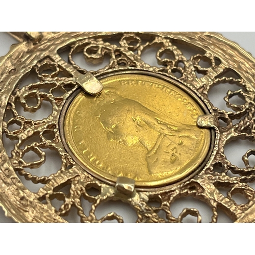 2039D - An 1887 Queen Victoria 22ct gold full sovereign with 9ct gold mount and yellow metal chain - approx.... 