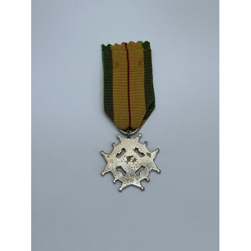 2203 - A Rhodesian Member of The Legion of Merit Military Division medal