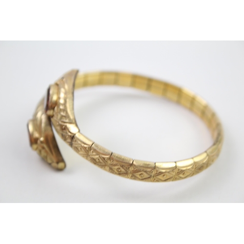 2004 - An Andreas Daub rolled gold snake bangle - approx. gross weight 23g