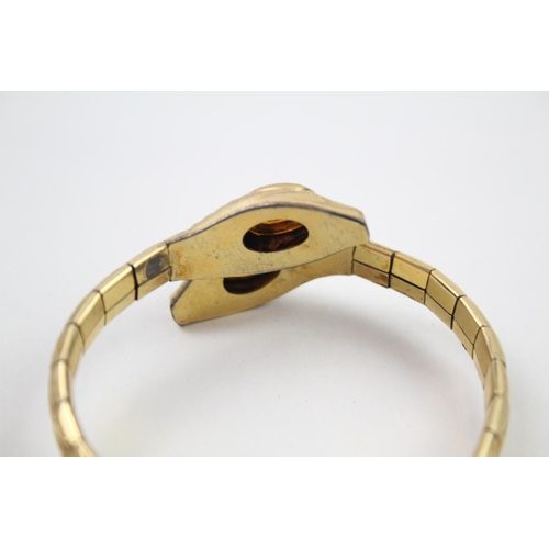 2004 - An Andreas Daub rolled gold snake bangle - approx. gross weight 23g