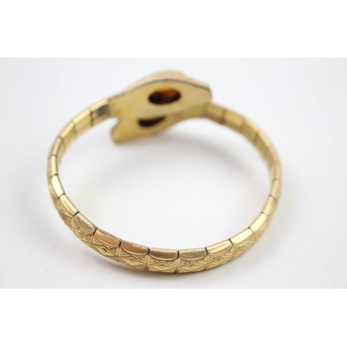 2004 - An Andreas Daub rolled gold snake bangle - approx. gross weight 23g