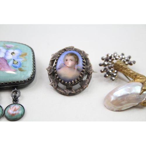 2010 - Four 19th century and later brooches to include coral, handpainted porcelain etc. - approx. gross we... 