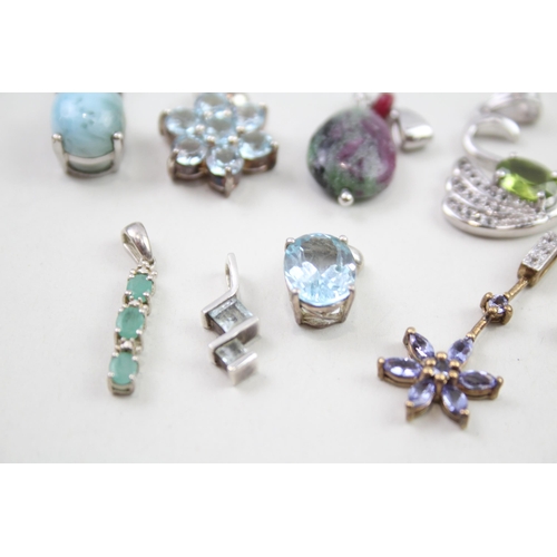 2013 - A collection of silver gemstone set pendants - approx. gross weight 28g