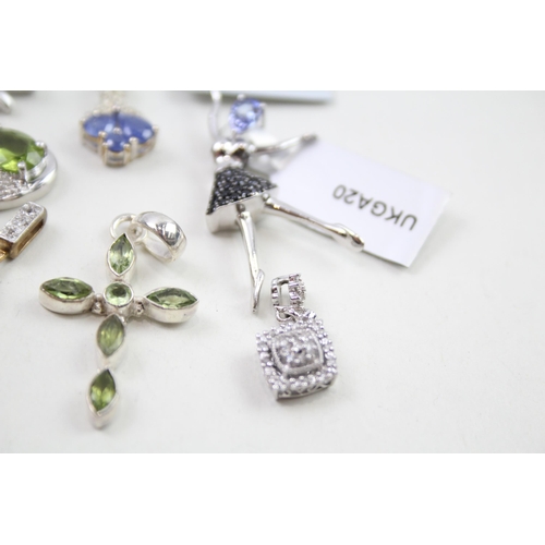 2013 - A collection of silver gemstone set pendants - approx. gross weight 28g