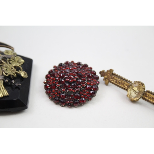 2016 - Four Victorian brooches and pendants to include garnet, citrine etc. - approx. gross weight 53g