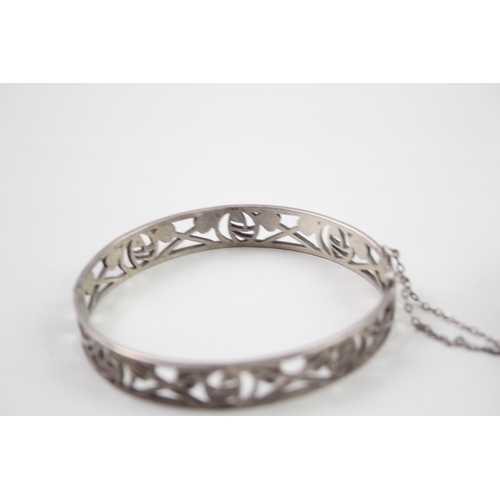 2023 - Two hallmarked sterling silver cutwork bangles - approx. gross weight 31g