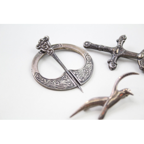 2024 - Four silver Celtic brooches to include Ola Gorie etc. - approx. gross weight 38g