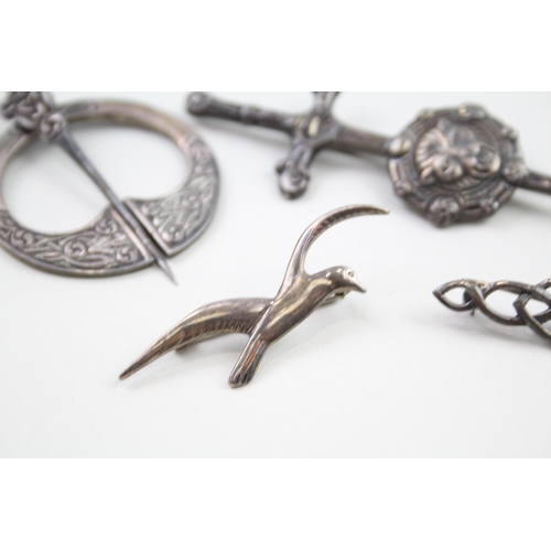 2024 - Four silver Celtic brooches to include Ola Gorie etc. - approx. gross weight 38g