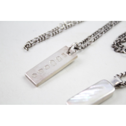 2034 - Two hallmarked sterling silver pendant necklaces, one mother of pearl and one ingot - approx. gross ... 