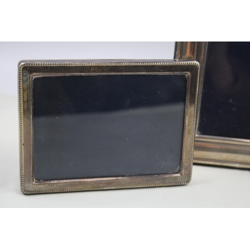 2132 - Three .925 sterling silver photograph frames - largest approx. 14cm x 18cm