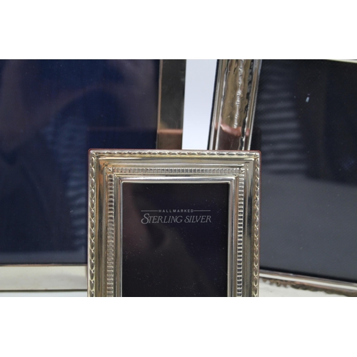 2139 - Three .925 sterling silver photograph frames - largest approx. 16cm x 21.5cm