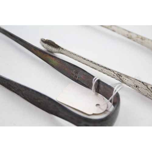 2160 - Two pairs of .925 sterling silver sugar tongs, one Hester Bateman and one other - approx. gross weig... 