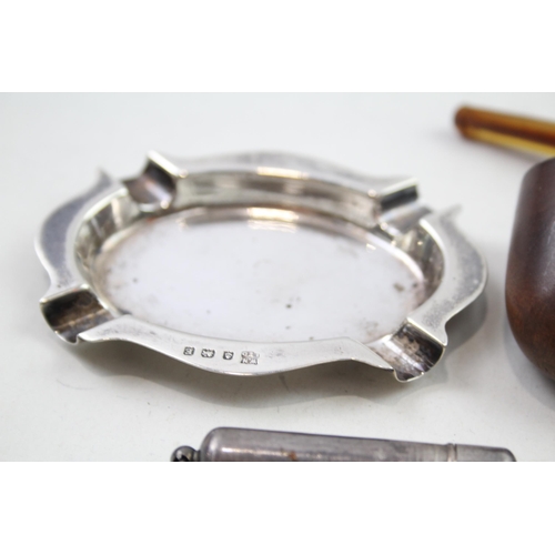 2177 - Five .925 sterling silver tobacciana items to include two sterling silver collared smoking pipes, as... 