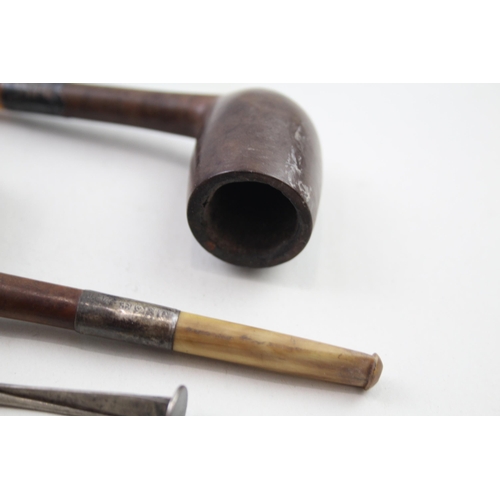 2177 - Five .925 sterling silver tobacciana items to include two sterling silver collared smoking pipes, as... 