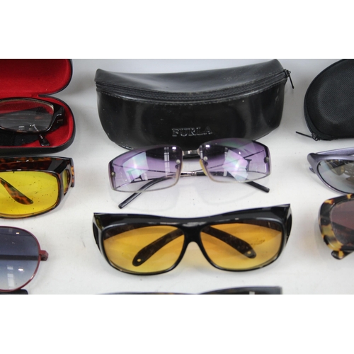 494 - A collection of sunglasses to include Ray-Ban etc.