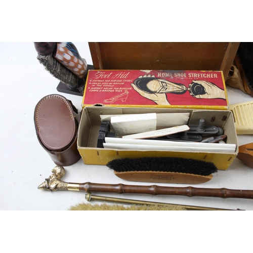 498 - A collection of early/mid 20th century vanity items to include boxed Foot Aid home shoe stretcher, c... 