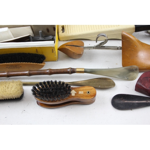 498 - A collection of early/mid 20th century vanity items to include boxed Foot Aid home shoe stretcher, c... 