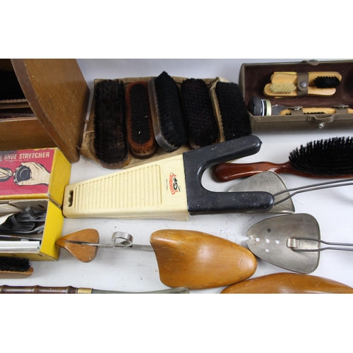 498 - A collection of early/mid 20th century vanity items to include boxed Foot Aid home shoe stretcher, c... 